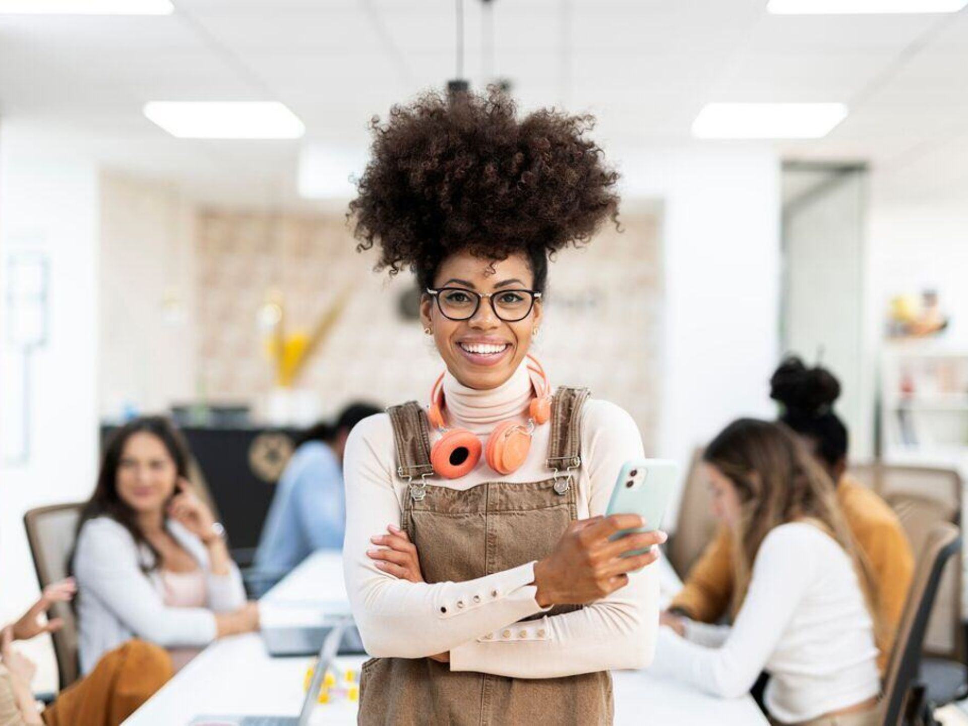 Portrait of business woman with cell