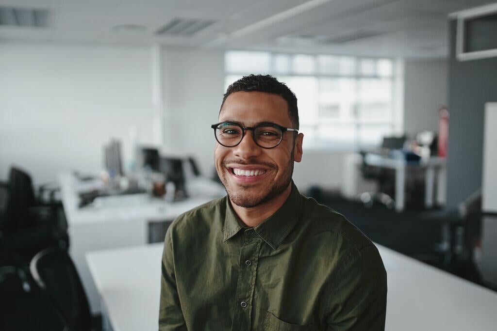 Friendly and smiling young african american professional